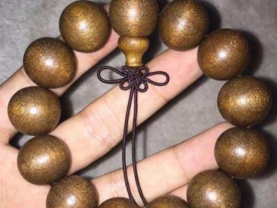 金丝柚假冒金丝楠木手串